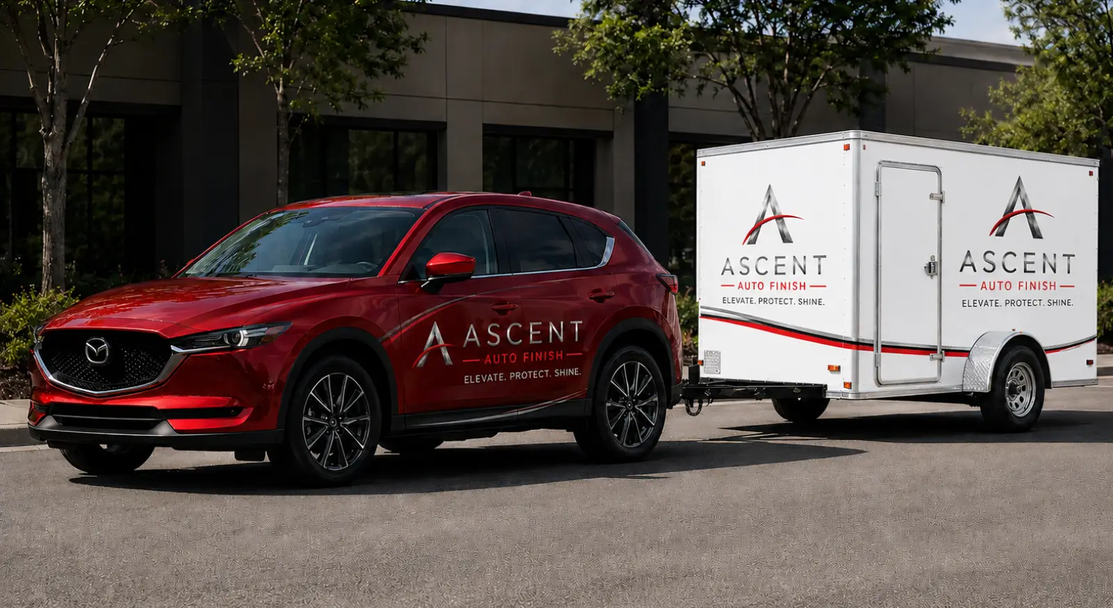 Ascent Auto Finish Co. red service vehicle with white mobile detailing trailer